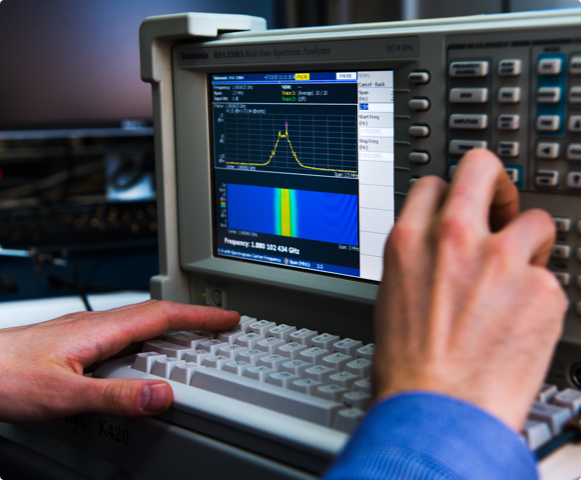 person using a spectrum analyzer