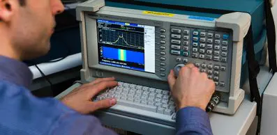person using a spectrum analyzer